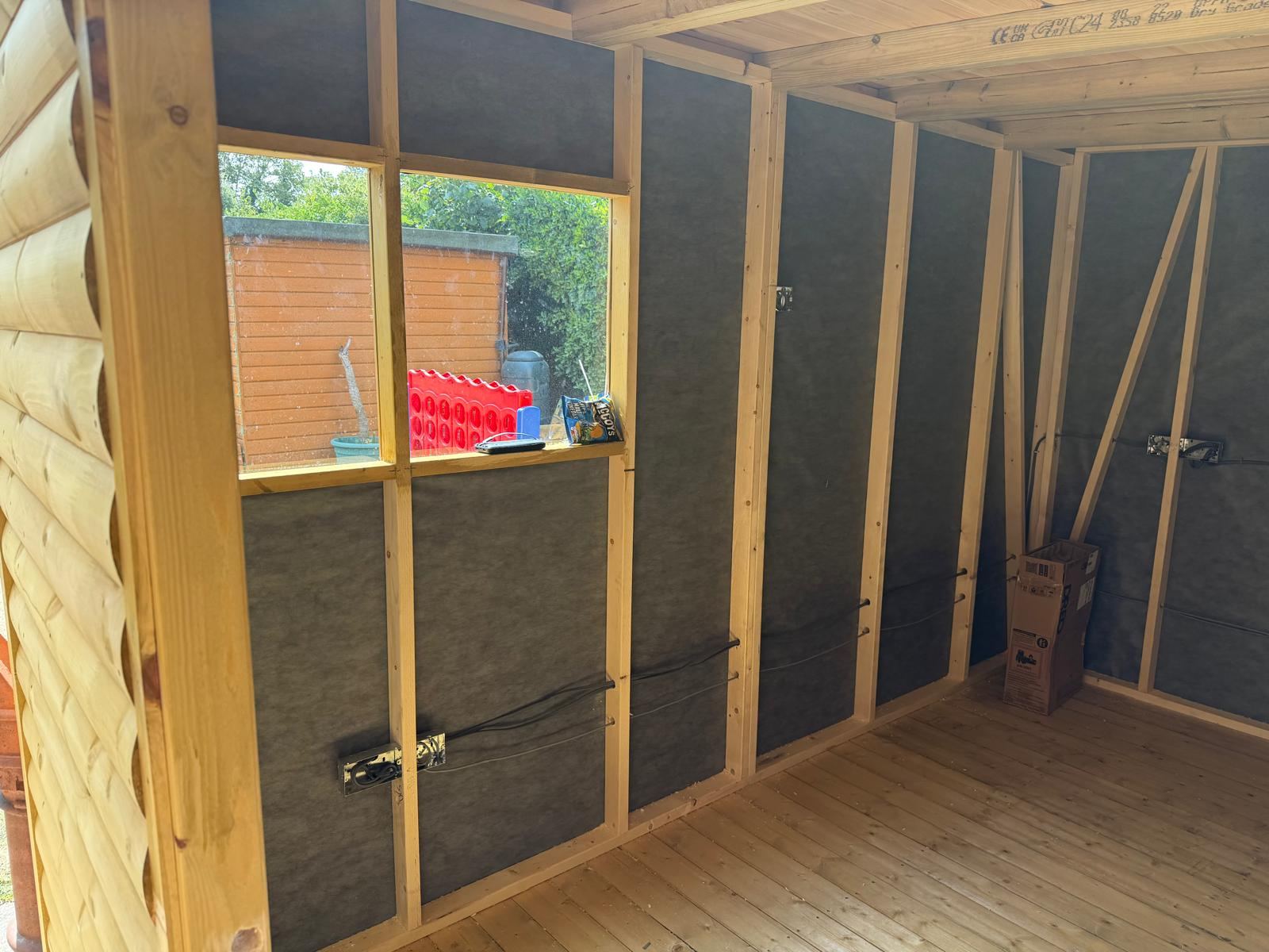 First fix sockets fitted along a stud wall in a garden office build